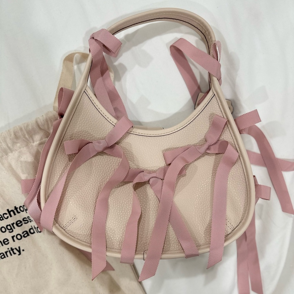 Ergo Bag In Coachtopia Leather With Allover Bows